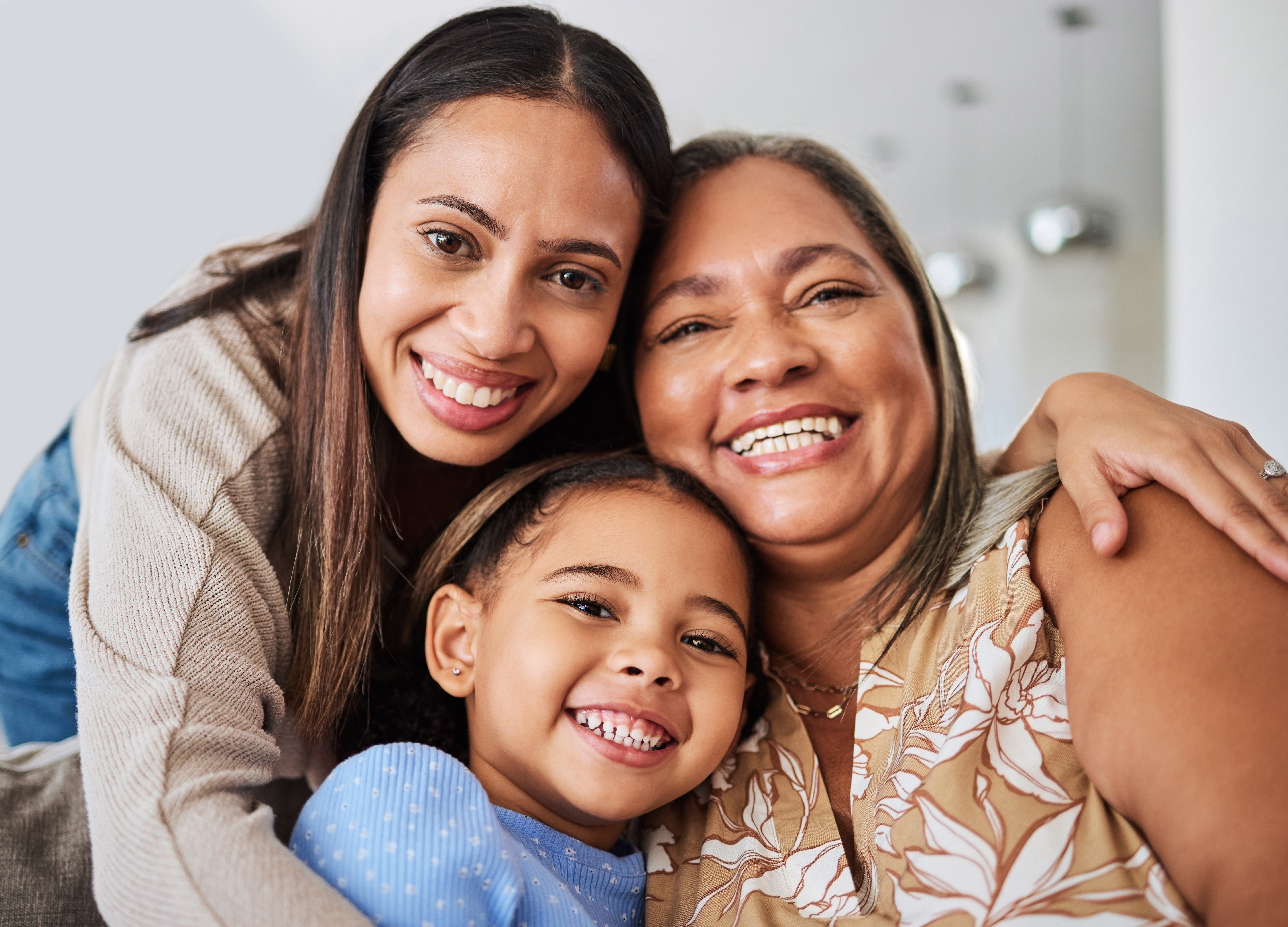 Smiling Mother, Daughter, and Granddaughter